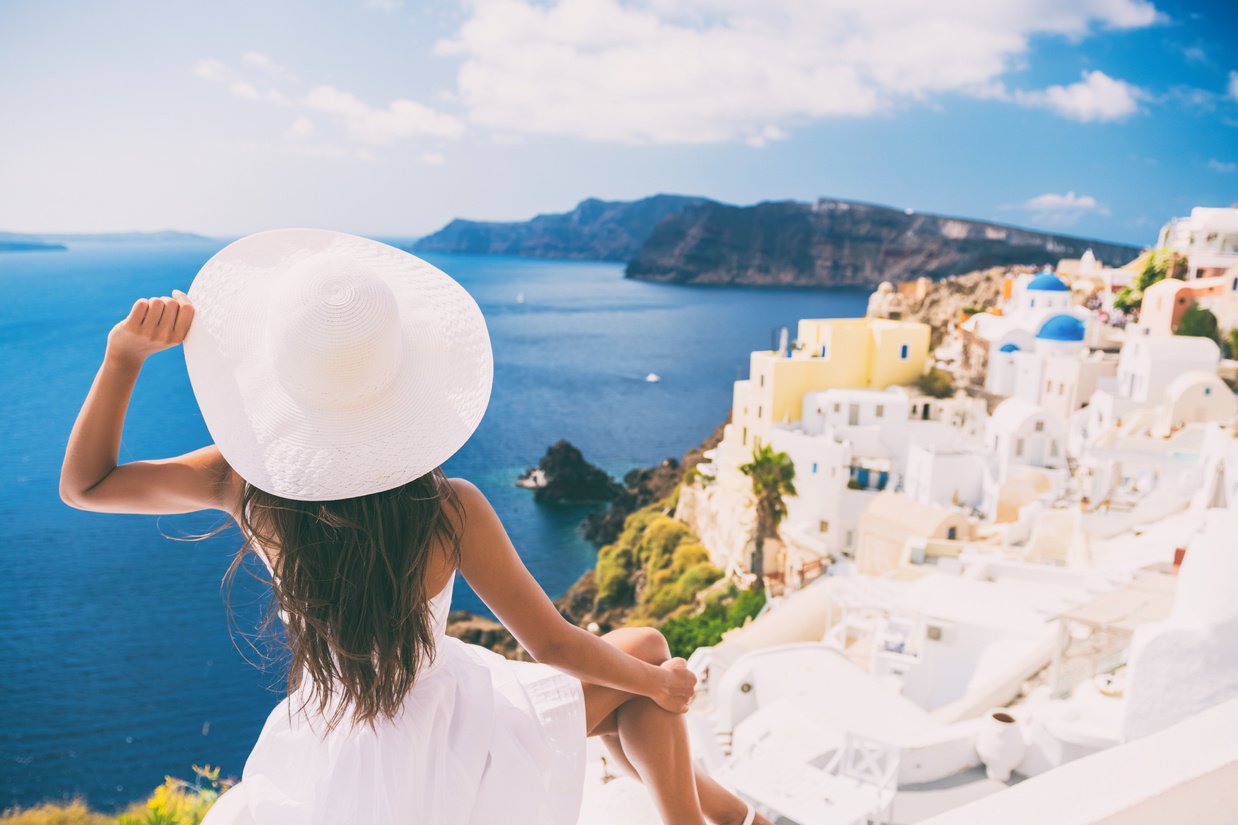 Tourist Woman at View of Santorini Cruise Travel